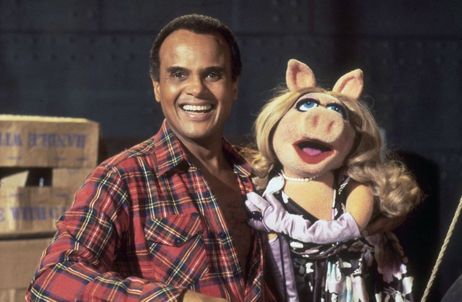 Harry Belafonte poses with Miss Piggy.