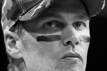 A black-and-white photo of Tom Brady