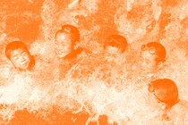 A group of 5 kids swims in water