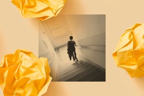 A student walks down the stairs