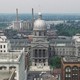 A color photo of Indianapolis, Indiana, seen from above, with the state capitol building seen at center.