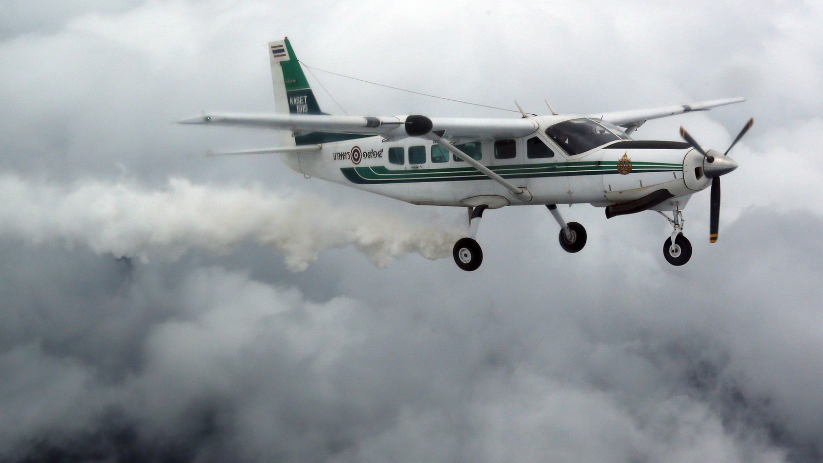 plane conducting cloud seeding