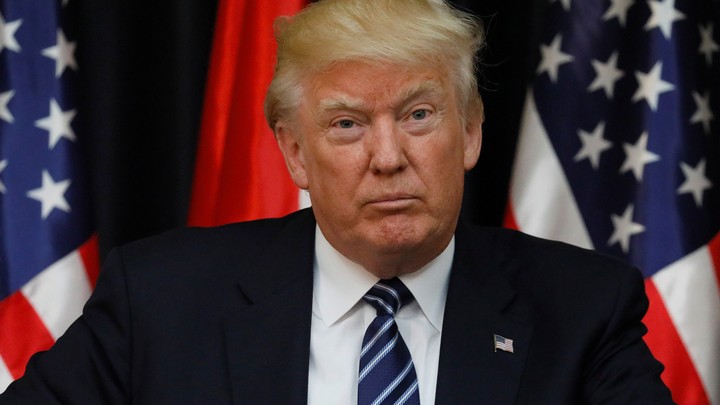 Trump pauses during his comments about the attack in Manchester, England.