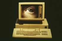 image of a computer with an eye on the screen