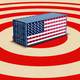 An illustration of a shipping container with the American flag on it on top of a red bull's-eye