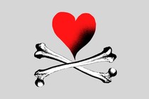 An illustration of a red heart over crossed bones.