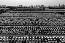 Aerial view of new Nissan vehicles sit parked at a parking lot in Xiangyang, Hubei Province of China