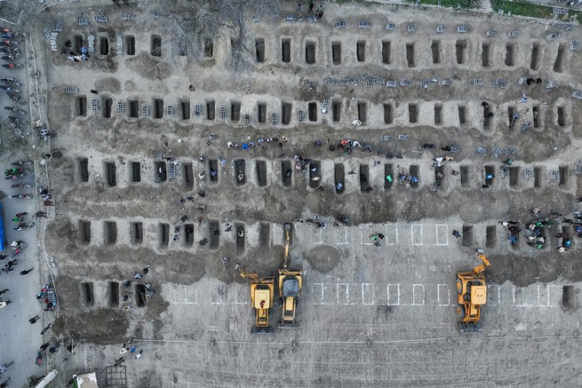 An aerial photo of graves being prepared 
