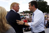 Ted Cruz greets Donald Trump onstage as they address a Tea Party rally in September 2015.