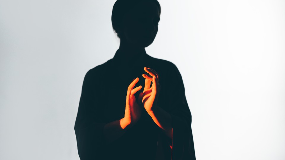 An unrecognizable woman silhouette