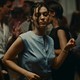A woman dances at a party in the film "Happening."