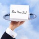 Hand holding a platter with a "bare your soul" invitation card