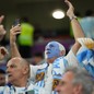 Argentina fans cheer as their team plays Australia in Doha on December 3, 2022