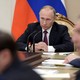 Russian President Vladimir Putin chairs a meeting with members of the government at the Kremlin in Moscow, Russia, September 19, 2016.