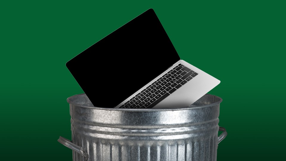 An illustration of a laptop in a trash can