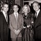 A black-and-white photograph of the Murdoch family in 1987, with (from left to right) Lachlan, James, Anna, and Rupert