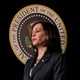 Kamala Harris in front of the presidential seal