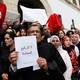 Tunisian lawyers gather as they demonstrate against the government's proposed new taxes, near the courthouse, in Tunis, Tunisia October 21, 2016.