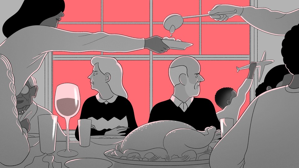 A family holiday dinner with older parents facing away from each other