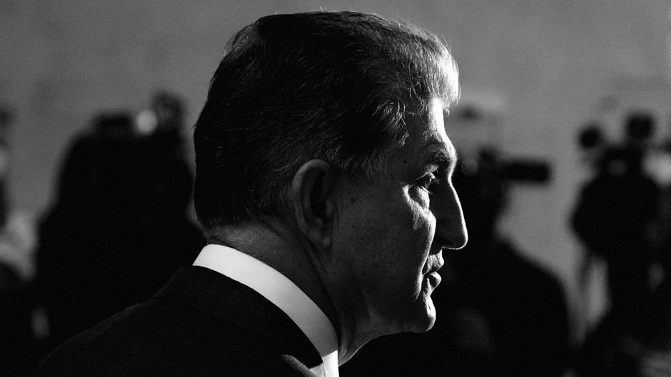 A black-and-white image of Senator Joe Manchin in profile