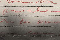 Handwriting placed between strands of barbed wire