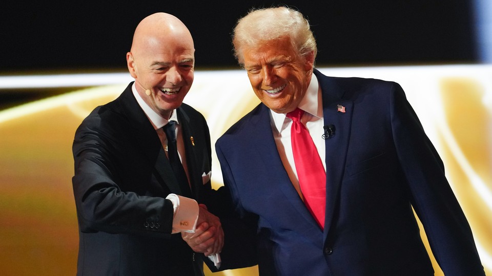 a photo of Donald Trump and Gianni Infantino shaking hands