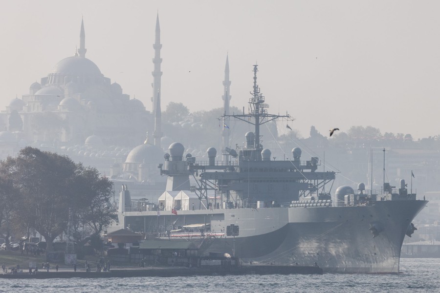 A large navy ship is seen docked in Istanbul.