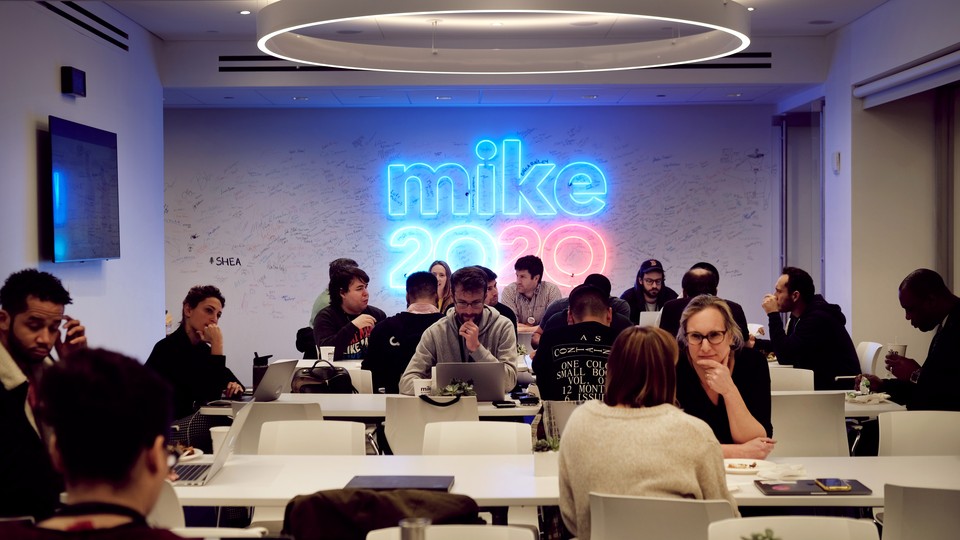 Staffers working in Mike Bloomberg's campaign office.