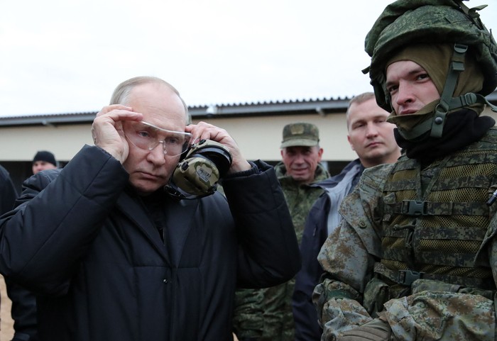 Vladimir Putin meeting Russian soldiers during an October 20 visit