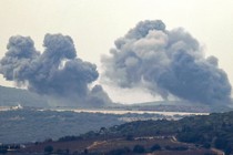 Photo taken from a position along the border in northern Israel on December 27, 2023, shows smoke billowing in the southern Lebanese village of Marwahin following Israeli bombardment amid ongoing cross-border tensions as fighting continues between Israel and Hamas militants in the Gaza Strip