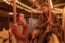 Bella Ramsey and Storm Reid on a carousel