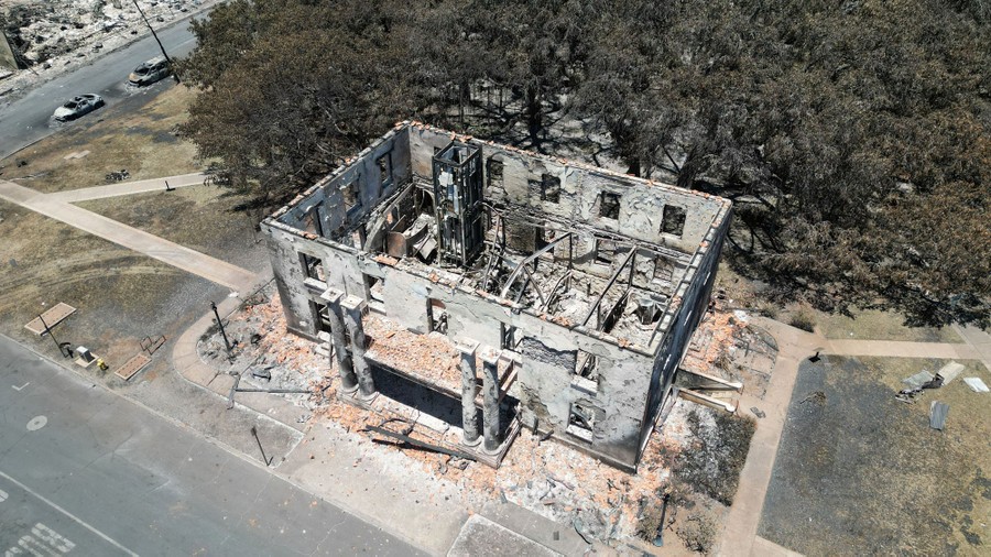 An aerial photo of a fire-destroyed historic structure.
