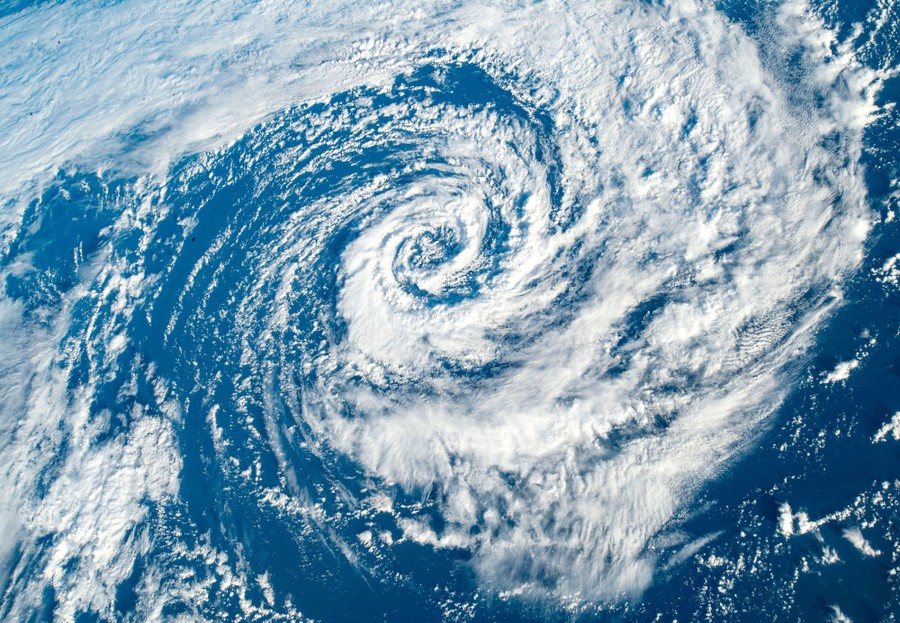A swirl of clouds above the southern Pacific ocean.