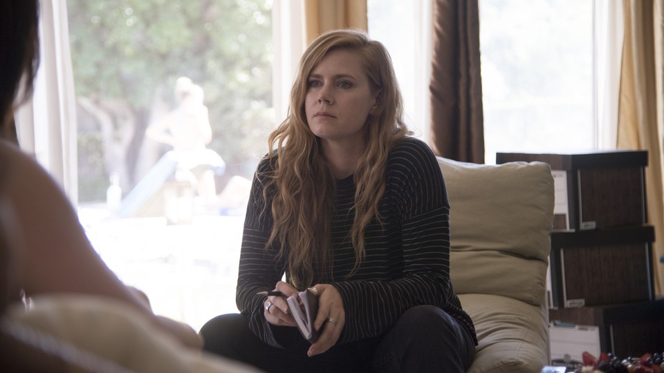 Camille Preaker (Amy Adams) conducts an "interview" in the HBO series 'Sharp Objects.'