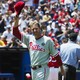 The Philadelphia Phillies pitcher Roy Halladay smiles and tips his hat to the crowd before his team plays the Toronto Blue Jays in a 2011 game in Toronto.
