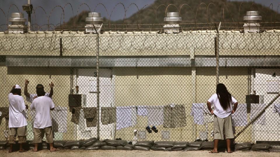 Detainees talk at the Camp 4 detention facility at Guantánamo Bay U.S. Naval Base in Cuba.