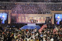 Streamers erupt at the 2008 DNC convention while people cheer