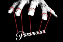 An illustration of a giant hand puppeteering the brand logo of Paramount