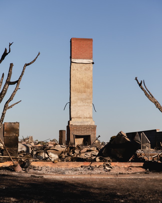 A photo of a burned-out home in California after a wildfire.