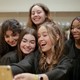 Teenagers pose for a selfie in a scene from "Girls State"