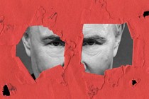Ripped red paper revealing Putin's eyes