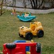 An empty yard with children's toys