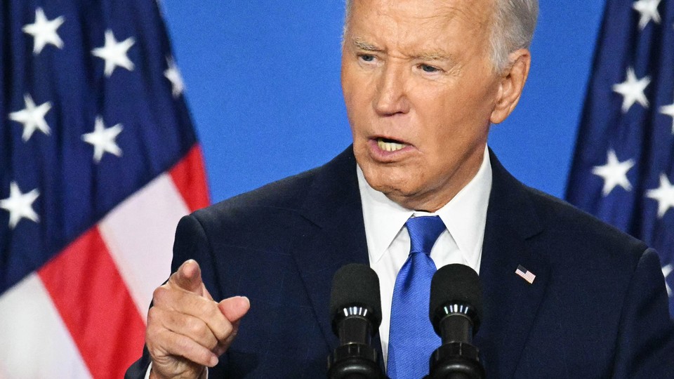 A close-up photo of President Joe Biden speaking at a press conference