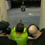 A person shoots a gun at a target. 