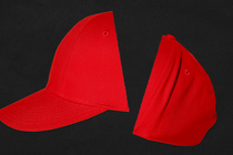 An illustration of a red (MAGA-type) hat against a black background