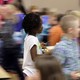 A blurry photo of students in a school cafeteria