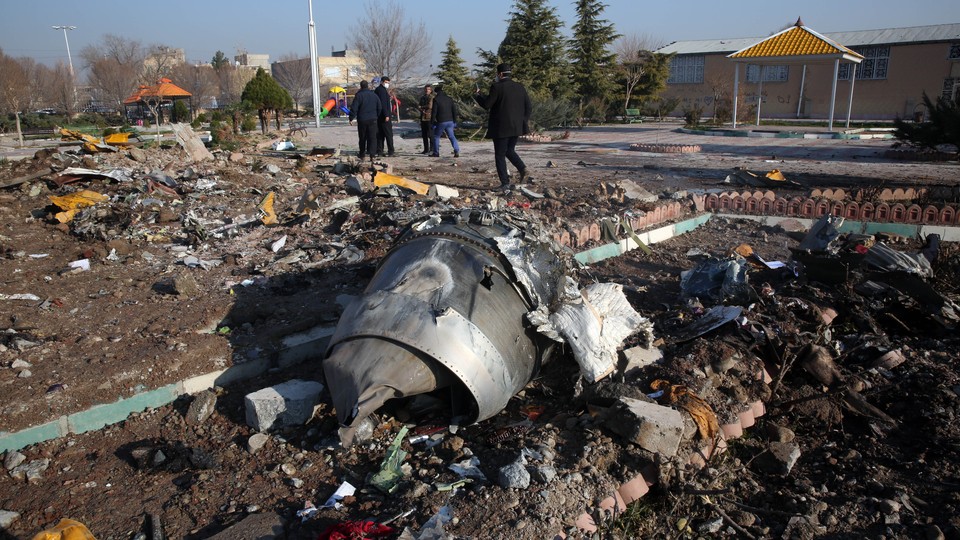 Rescue teams amid the debris of a Ukranian jet that crashed near Tehran’s airport.