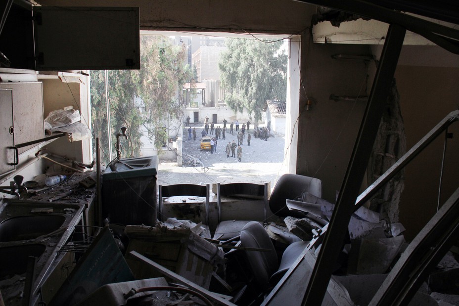 A view outside from within a destroyed apartment in Syria