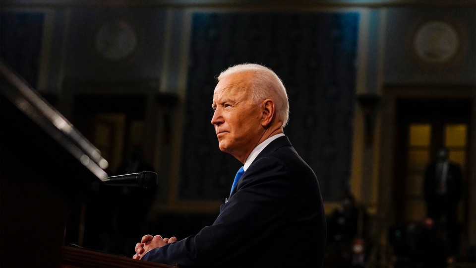 Side photo of Joe Biden looking resolute