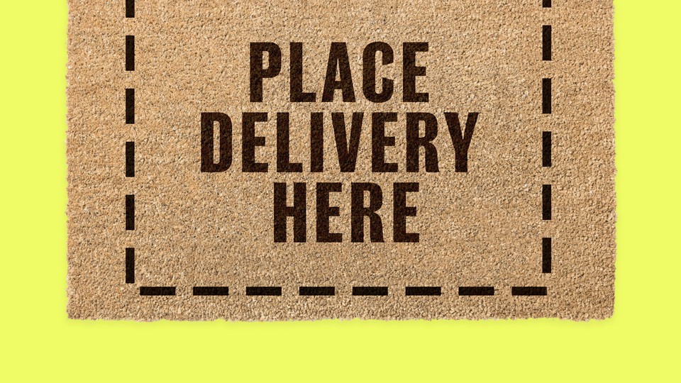 A doormat that reads, "PLACE DELIVERY HERE"